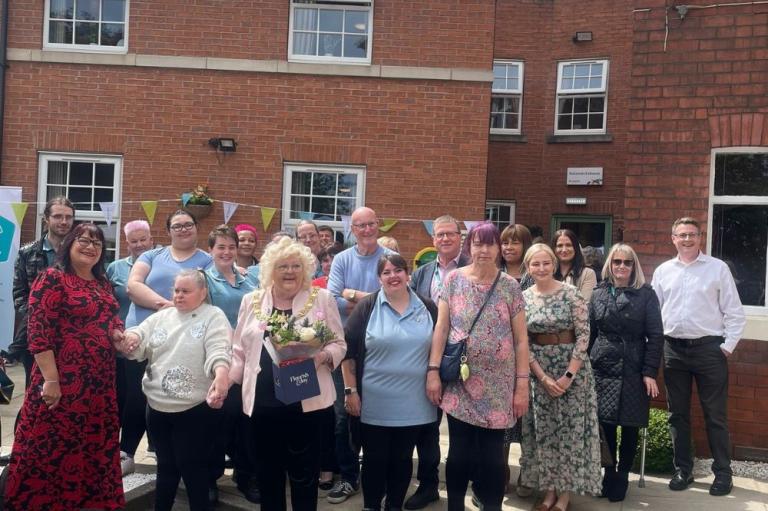 Guests gathered outside a care home